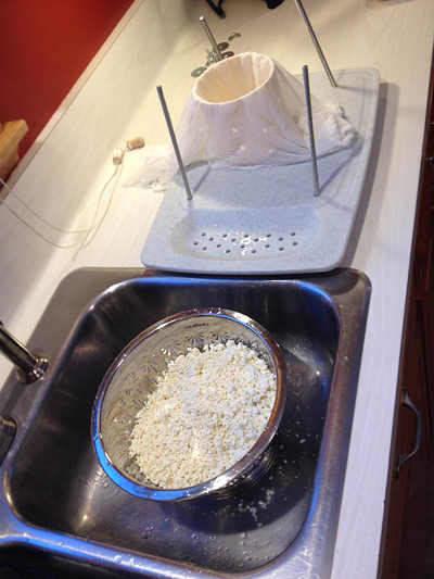 The home made cheese press is set up and waiting for the curds. Placing it right next to the sink is helpful.