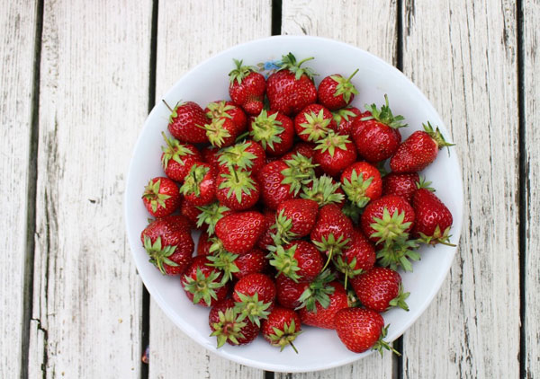 strawberries in a white bowl